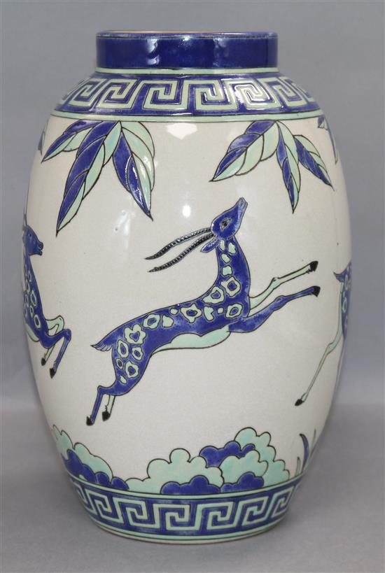 An Art Deco style vase, decorated with antelopes height 28.5cm